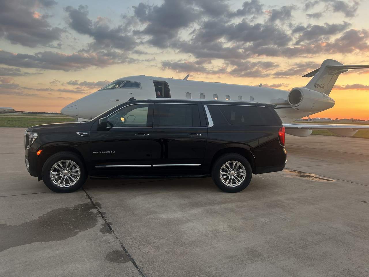 Yukon private jet sunset — Houston Limo Chauffeur